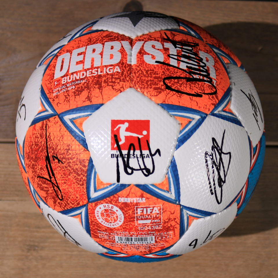 Matchball signed by the whole squad